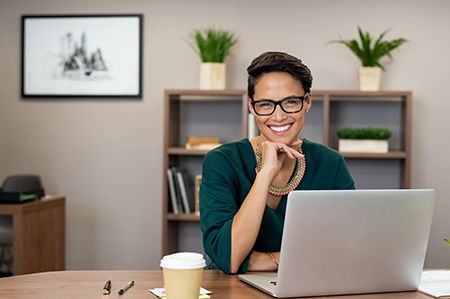 A diverse group of businesspeople poses for a professional team photo, exuding confidence and professionalism, while looking smart and impeccable