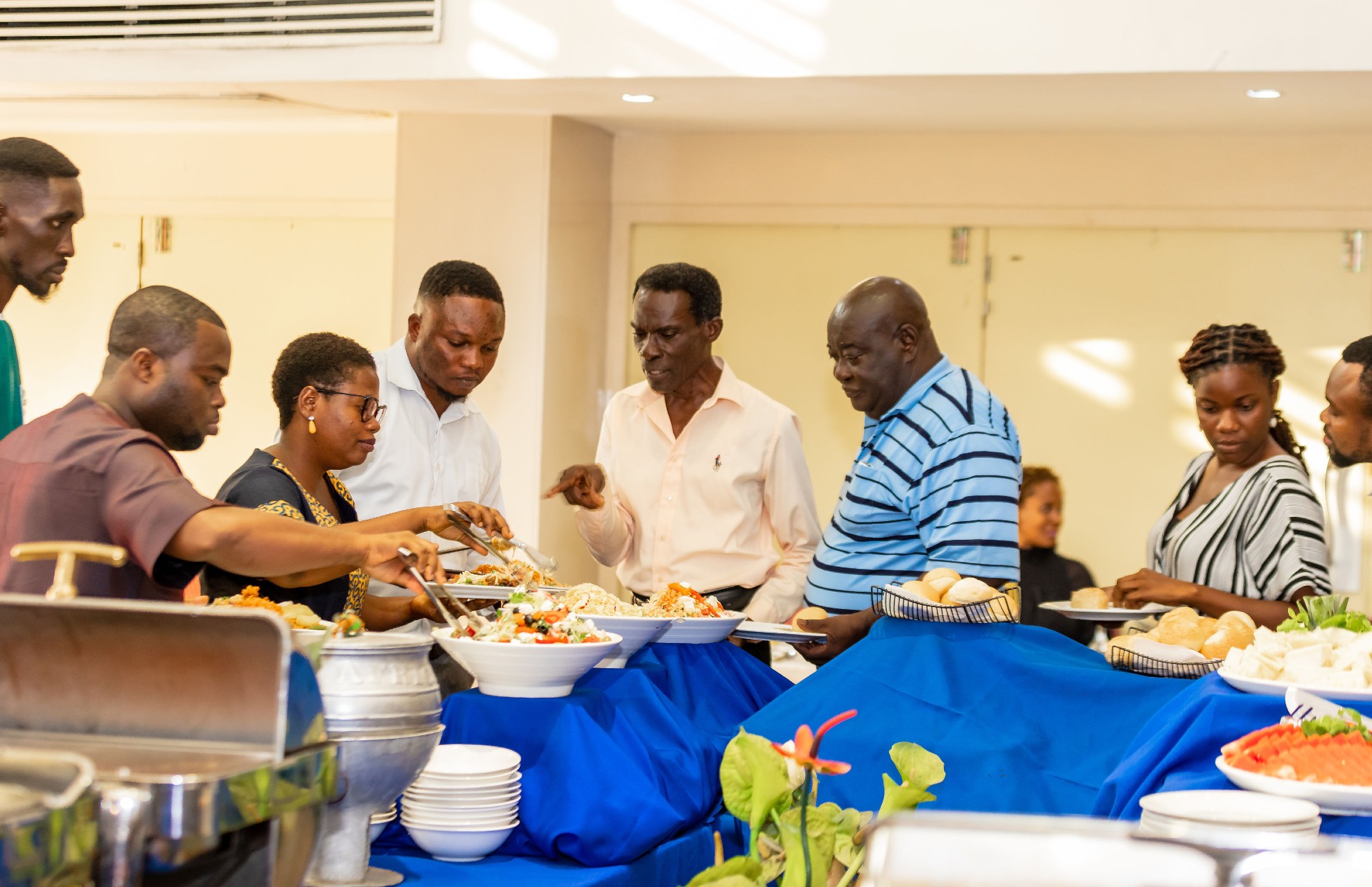 People in line for a buffet